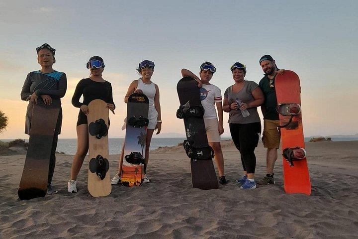 Sandboarding in the Mogote Sand Dunes in La Paz